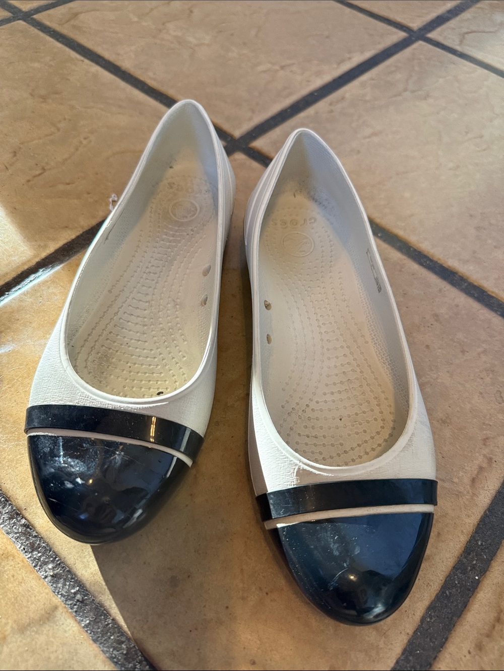 CROCS White Flats with Black Cap-Toe Trim